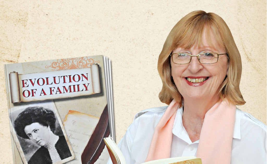 Helen Neville with her book Evolution of Family. Helen Neville with her book Evolution of Family.